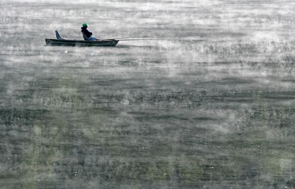 Smoking Fisherman, Mountain Lake, Smallwood, New York  2005