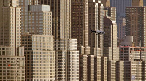 Police helicopter in front of Trump buildings